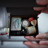 Elegant Wooden Gift Box. Contains one piece of natural soap, one bottle of pure argan oil 60ml, and a lip balm. Monarchess Natural Luxuries skin care products. Monarchess, Amman, Jordan