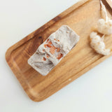 Clay Charm Soap. Moisturizing natural soap with shea butter, Dead Sea mud, and Moroccan Akr Fassi. Monarchess Natural Luxuries skincare products. Monarchess, Amman, Irbid, Jordan
