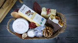 Gift Basket with two pieces of natural shea butter soap with different natural additives: rose oil, matcha tea, solid perfume, body scrub, lip balm, and pure argan oil 60ml, in a beautiful gift basket. Monarchess Natural Luxuries skincare products. Monarchess, Amman, Jordan