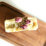 Milky Petals Soap. Moisturizing natural soap with shea butter, goat milk, and rose oil. Decorated with dry roses. Monarchess Natural Luxuries skin care products. Monarchess, Amman, Irbid, Jordan