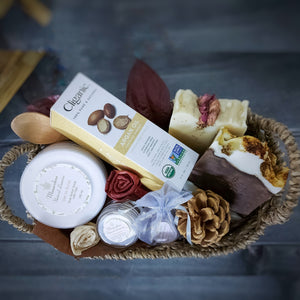Gift Basket with two pieces of natural shea butter soap with different natural additives: rose oil, matcha tea, solid perfume, body scrub, lip balm, and pure argan oil 60ml, in a beautiful gift basket. Monarchess Natural Luxuries skincare products. Monarchess, Amman, Jordan